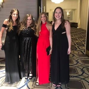 Red floor length gown with a slit